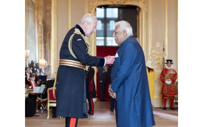 dr m afzal obe award