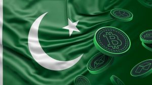 کرپٹو ٹوکنز کے آئیکون کے ساتھ پاکستان کا نقشہ اور کمپیوٹر سکرین