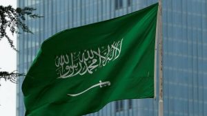 سعودی عرب کا پرچم اور دفاتر کی عمارت؛ ورک ویزا دستاویزات