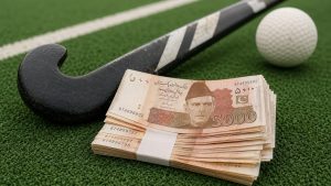 ہاکی کے کھلاڑی میدان میں مقابلہ کرتے ہوئے، پاکستان ہاکی فیڈریشن کا لوگو پس منظر میں
